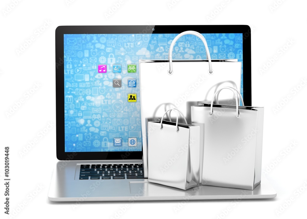 laptop and shopping pags on white background laptop and shopping pags on white background