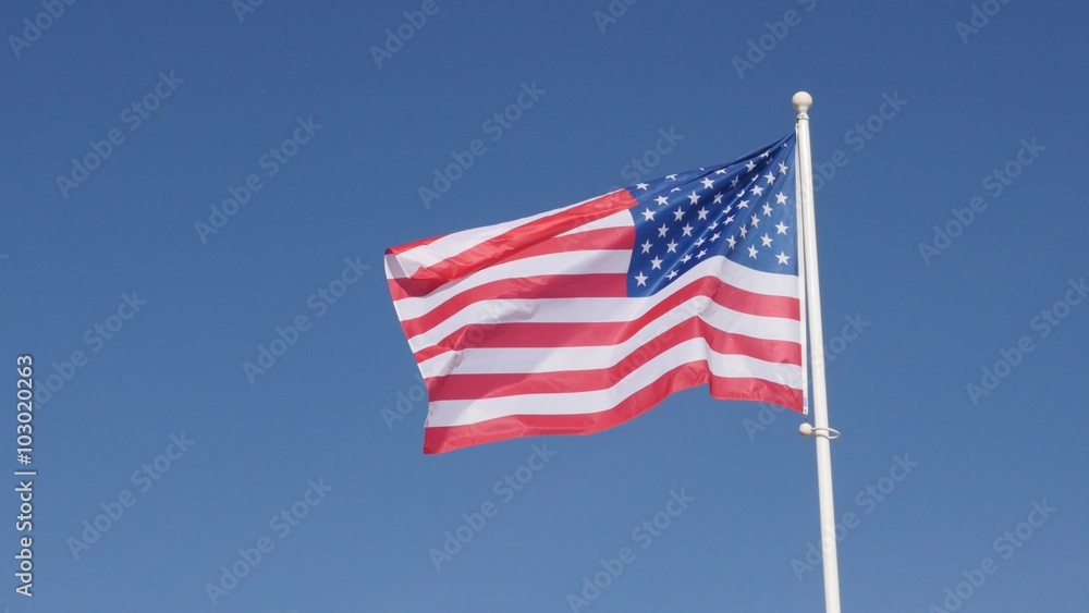 Famous American flag waving in front of blue sky 4K 2160p 30fps UHD footage - Recognizable flag of USA United States of America floating on pole 4K 3840X2160 UltraHD video Famous American flag waving in front of blue sky 4K 2160p 30fps UHD footage - Recognizable flag of USA United States of America floating on pole 4K 3840X2160 UltraHD video