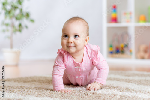 crawling funny baby indoors at home