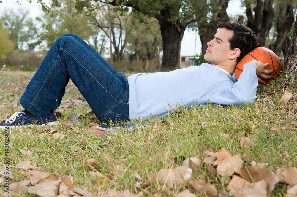 Man relaxed lying on the grass Man relaxed lying on the grass
