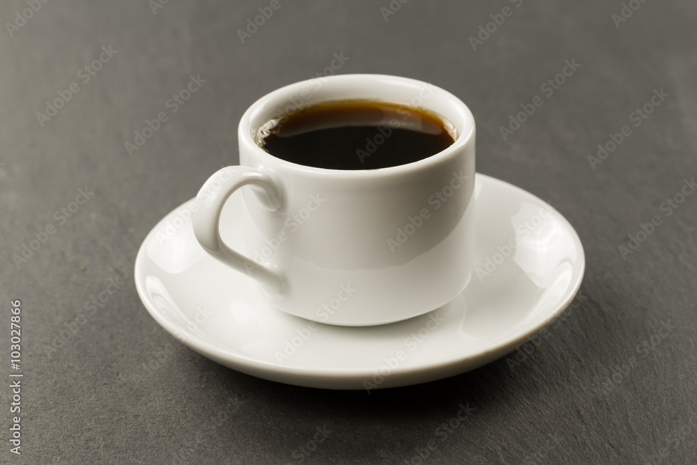 white black Cup of coffee on a black background. white black Cup of coffee on a black background.