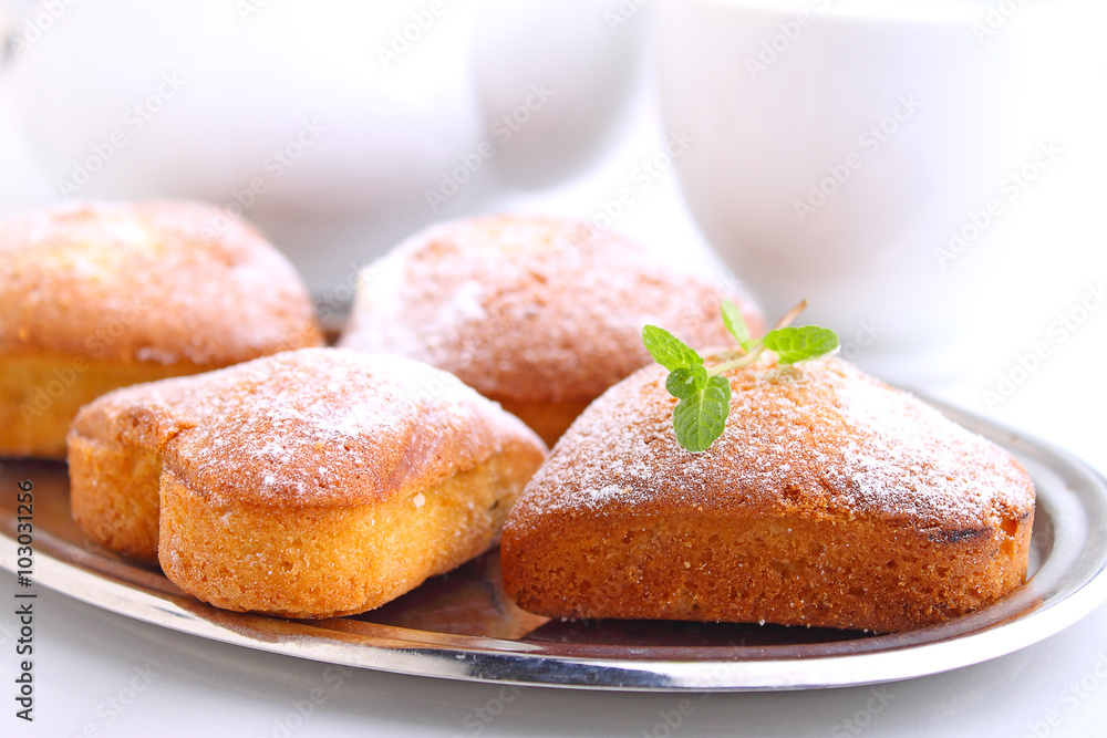 muffins in the form of heart with powdered sugar muffins in the form of heart with powdered sugar