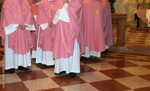 Fotografie, Obraz priests with cassock in church during the Holy Mass