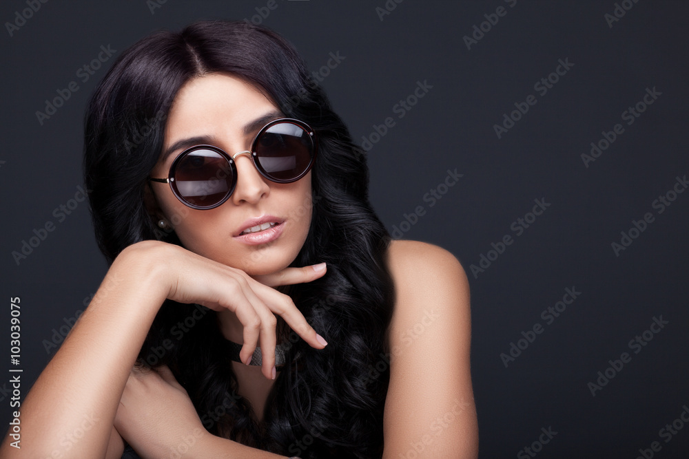 Beautiful woman in trendy round sunglasses Beautiful woman in trendy round sunglasses
