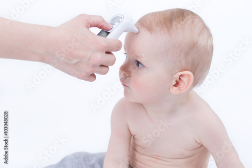 Measuring the temperature to baby