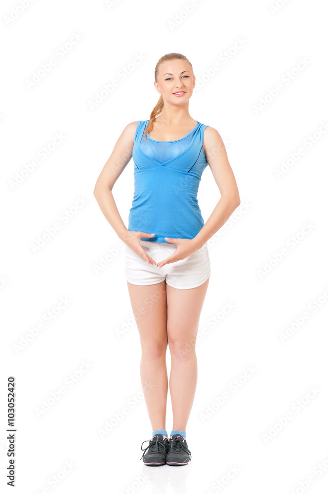Young happy woman doing fitness exercise Young happy woman doing fitness exercise