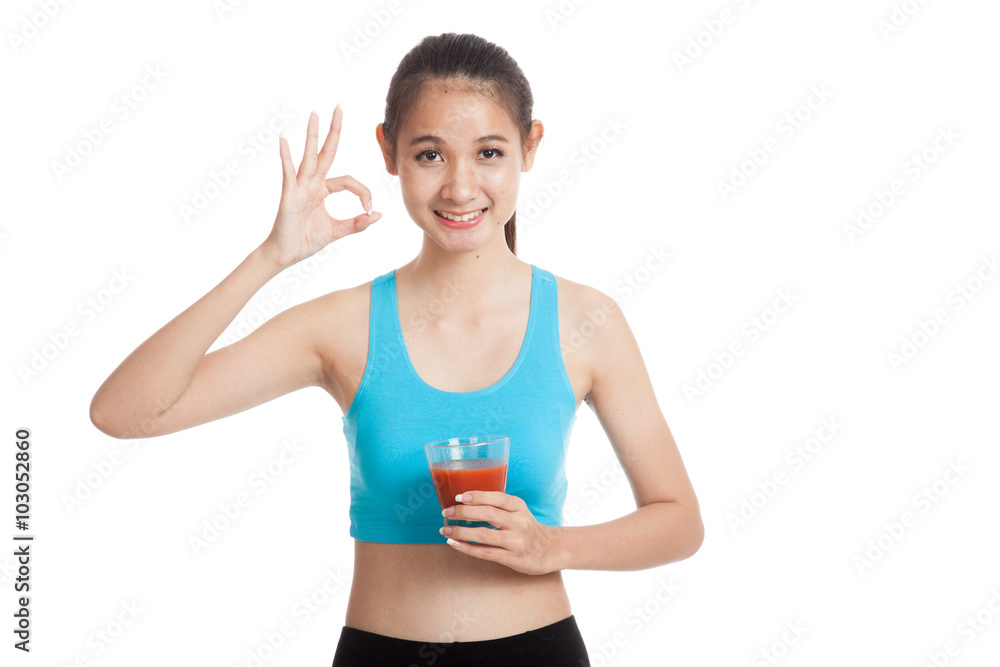 Beautiful healthy Asian girl show OK with tomato juice Beautiful healthy Asian girl show OK with tomato juice