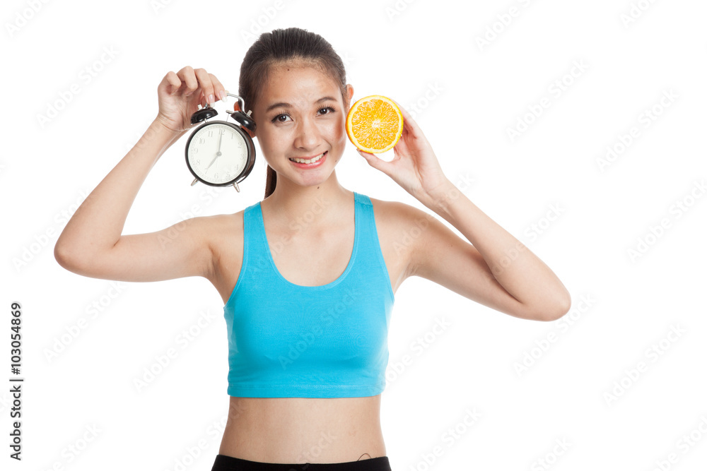 Beautiful Asian healthy girl with orange and clock Beautiful Asian healthy girl with orange and clock