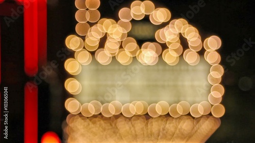 High definition movie of blinking out of focus blurred bokeh concert hall theater lights on broadway along a entertainment street 1080p