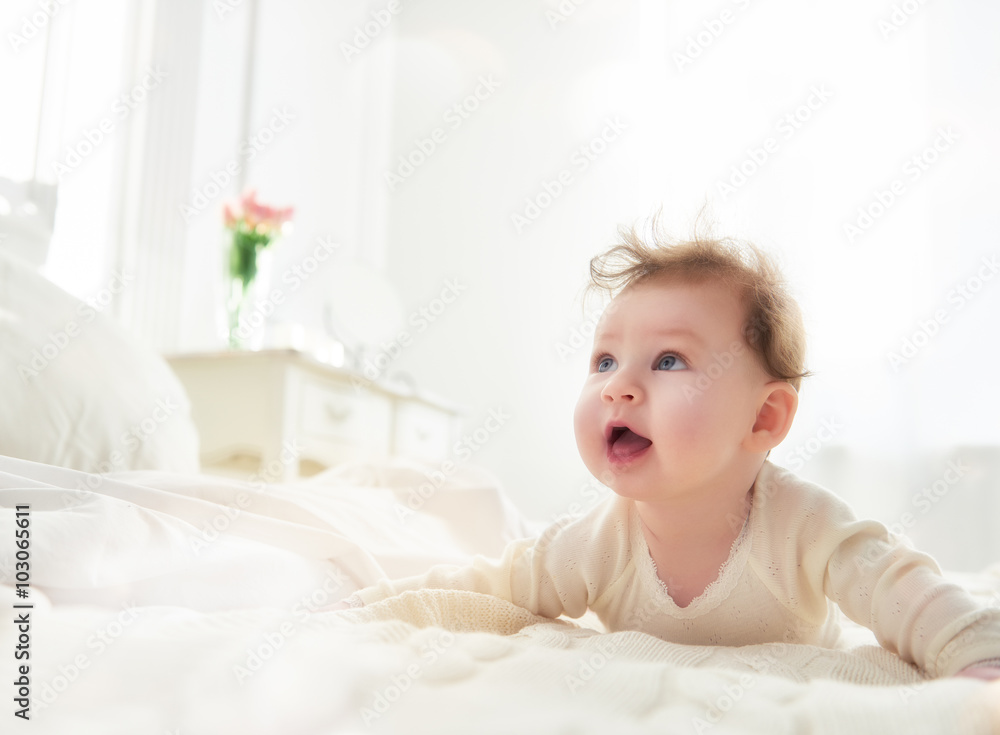 baby girl on the bed baby girl on the bed