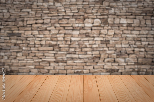 stone wall background with wooden slats floor