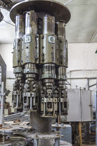 Old complex, industrial hydraulic mechanism.