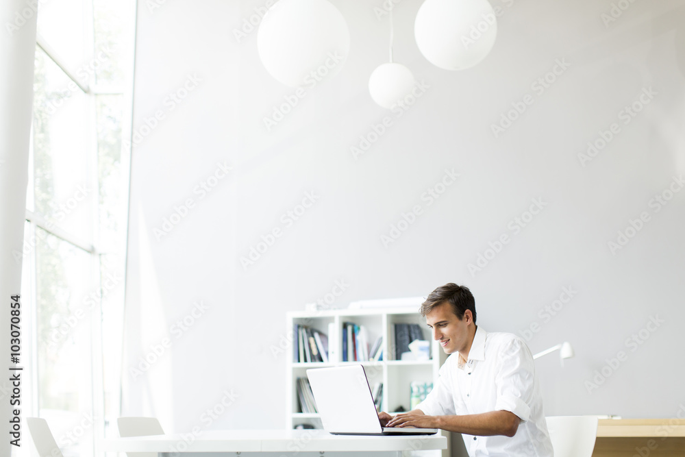 Young man in the office Young man in the office