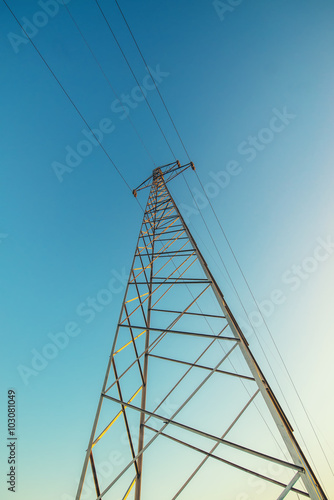 High voltage electricity pylon with wires, low wide angle view