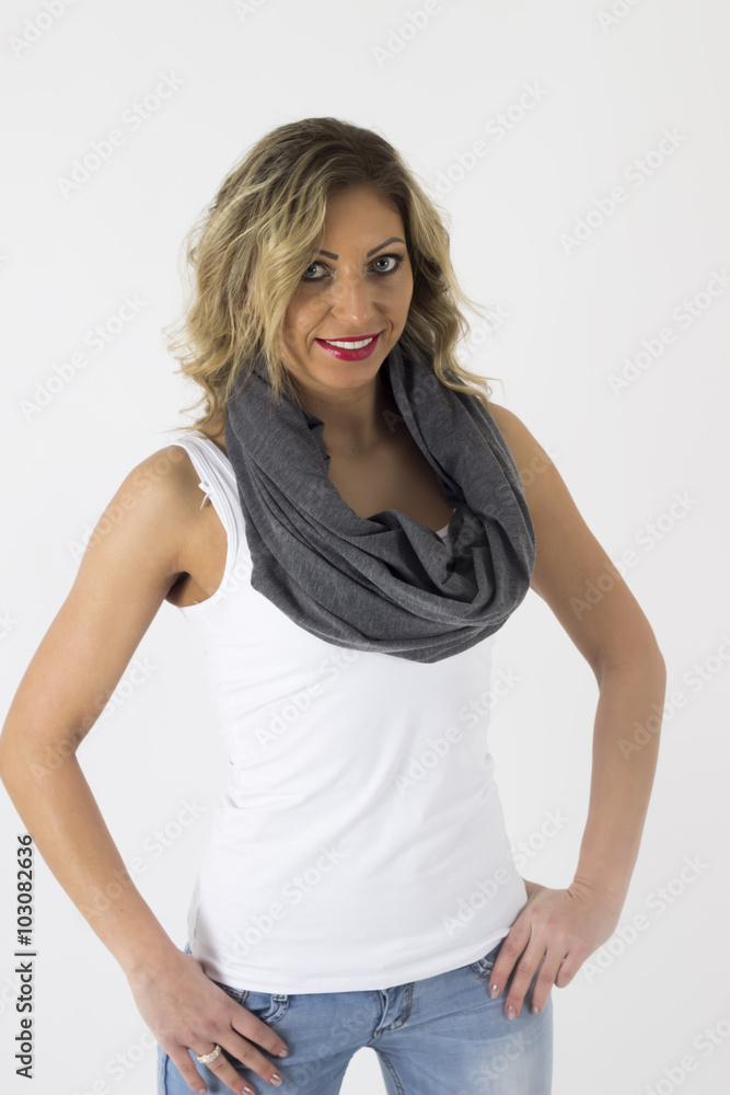 Beautiful young woman posing in studio on white background Beautiful young woman posing in studio on white background