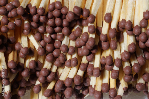 Fototapeta Naklejka Na Ścianę i Meble -  Pile of matches with dark brown heads