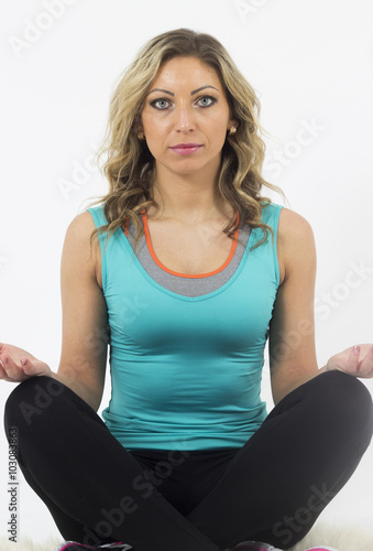 young woman doing yoga exercise