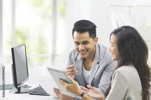 young business people at their office working together