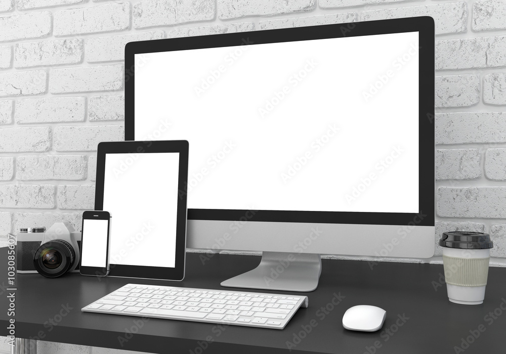 Responsive mockup screen. Monitor, tablet, phone on table in office. Responsive mockup screen. Monitor, tablet, phone on table in office.