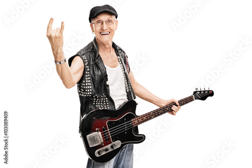 Canvas-taulu Old punk rocker making a rock gesture