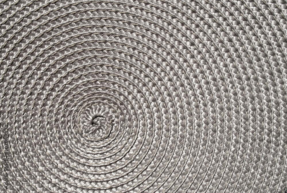 Obraz premium Grey rattan woven mat closeup