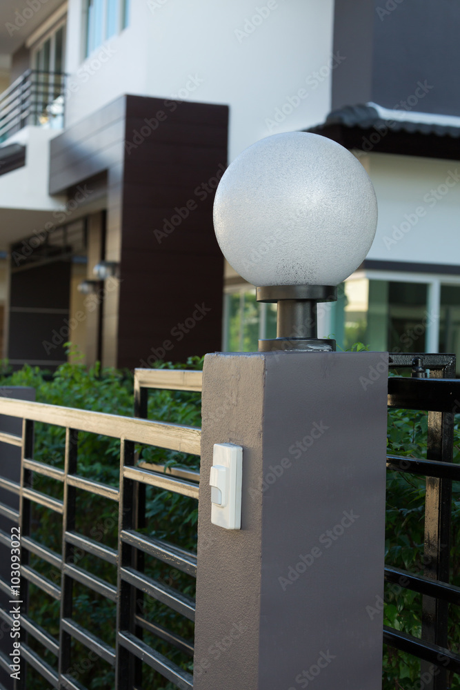 light lamp on front gate of decoration residential house Stock Photo |  Adobe Stock