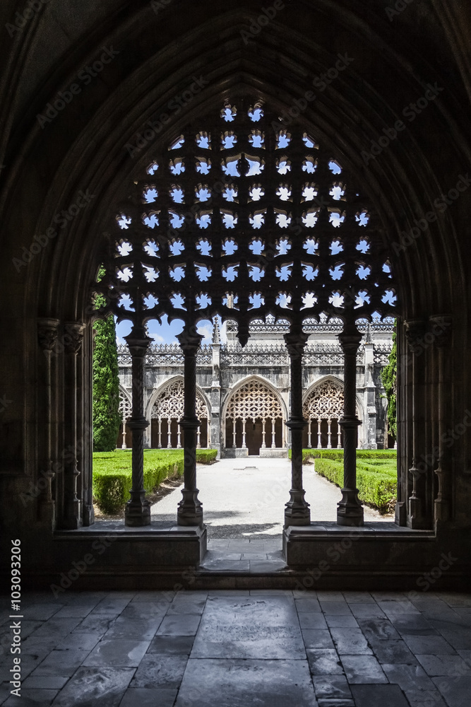 Batalha, Portugal - July, 2015: Silhouette of the tracery work on the Royal Cloister of the Batalha Abbey. Masterpiece of the Gothic and Manueline art. UNESCO World Heritage Site.