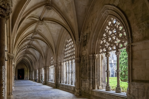 Batalha, Portugal - July, 2015: The Royal Cloister. Masterpiece of the Gothic and Manueline art. UNESCO World Heritage Site. photo