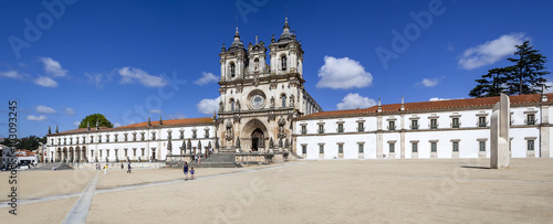 Alcobaca, Portugal - July, 2015: Alcobaca Monastery, a masterpiece of the Gothic architecture. Cistercian Religious Order. Unesco World Heritage. Portugal. photo