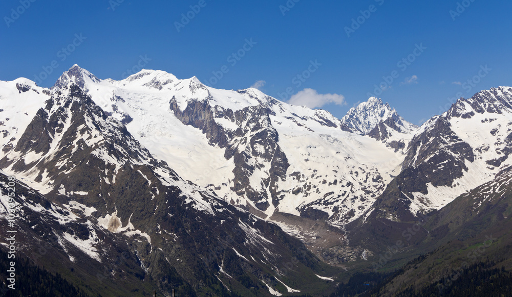  White peaks mountains of Dombai.The Caucasus.Russia. 