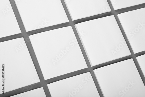 Collection of white note papers on gray background.