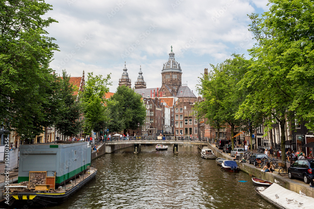 Canal and St. Nicolas Church in Amsterdam