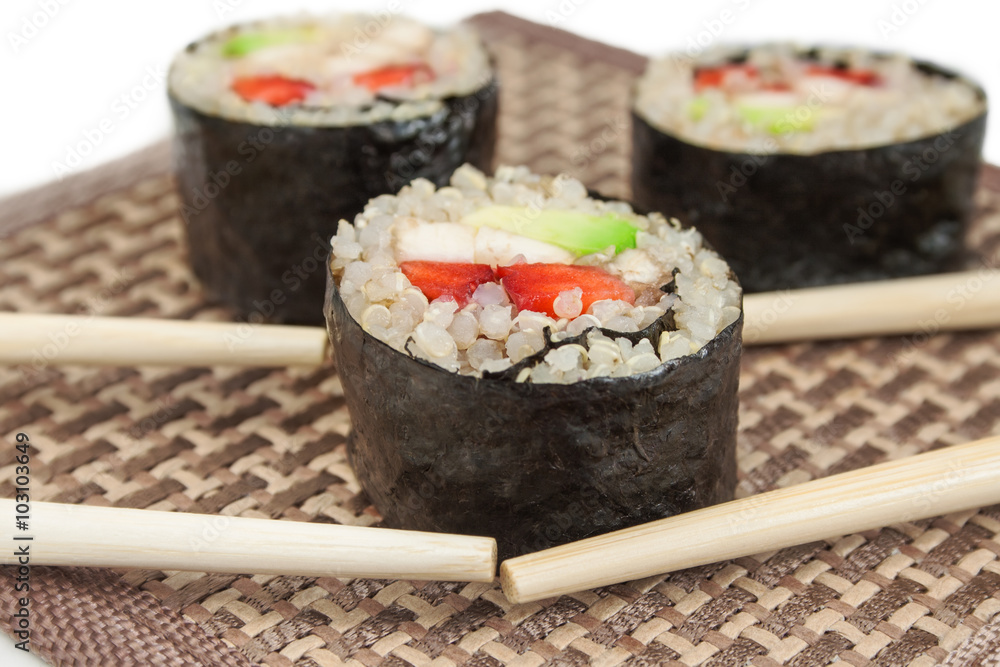 Close up image of sweet sushi rolls with quinoa and fruits. Close up image of sweet sushi rolls with quinoa and fruits.