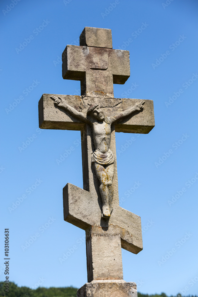 Old, abandoned stony Orthodox crosses