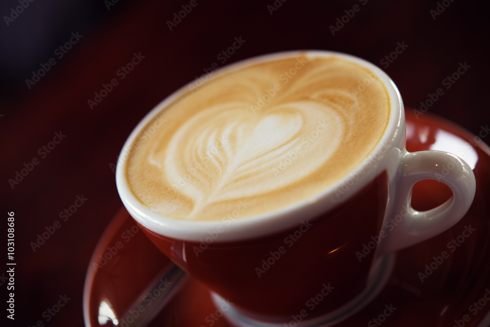 Hot Latte Coffee in coffee shop on table wooden Hot Latte Coffee in coffee shop on table wooden