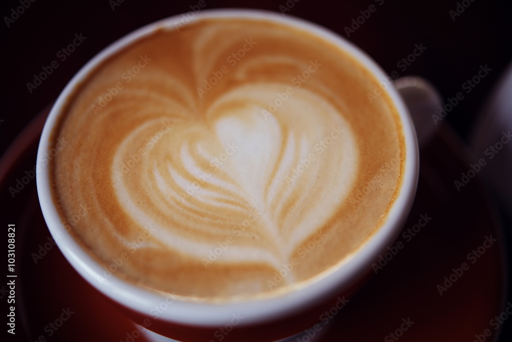 Hot Latte Coffee in coffee shop on table wooden Hot Latte Coffee in coffee shop on table wooden
