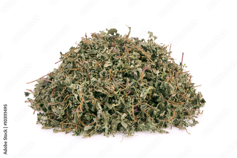 dried oregano leaves on a white background dried oregano leaves on a white background