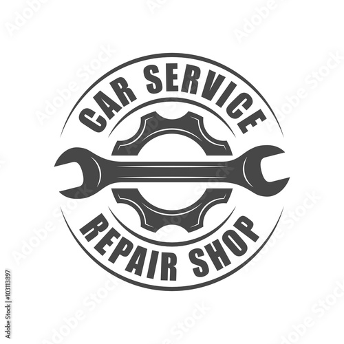 Auto service logotype, wrench and gear silhouette
