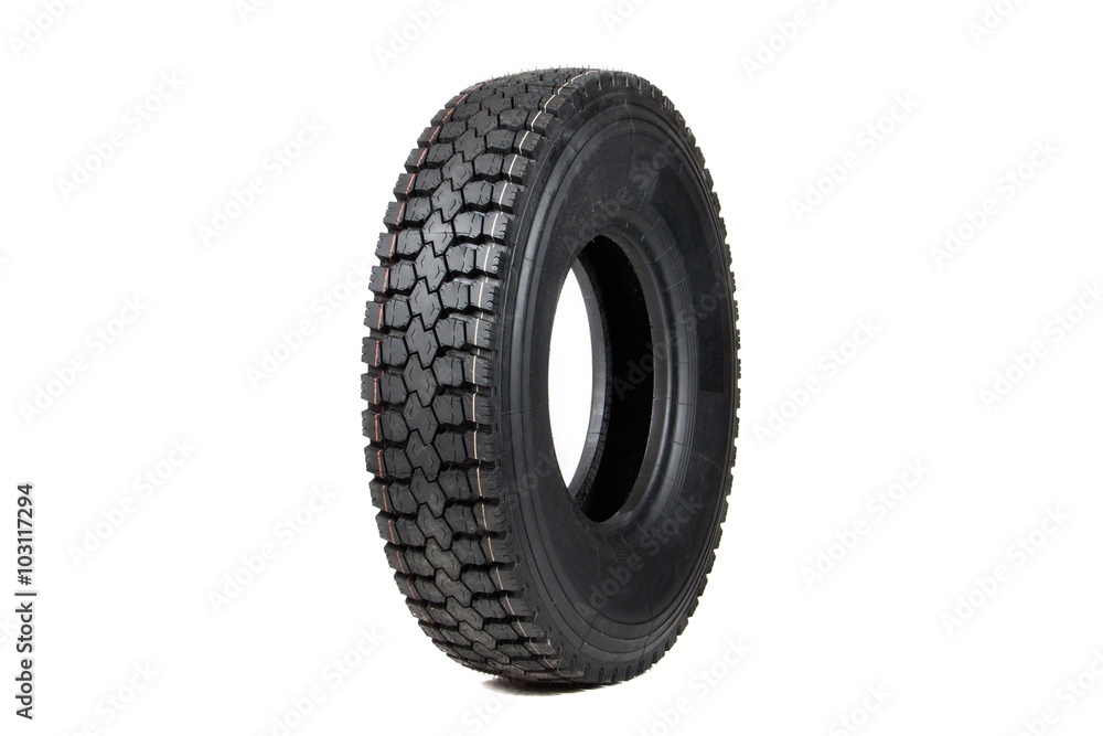 Car tire isolated on white background. Truck tire isolated. Dump tire isolated.