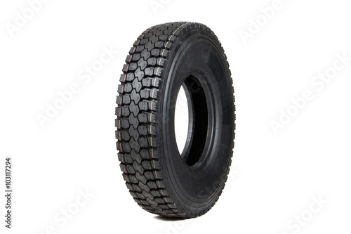 Car tire isolated on white background. Truck tire isolated. Dump tire isolated.