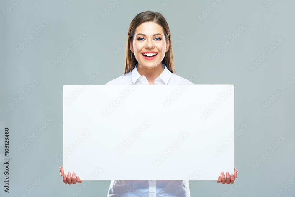 Smiling business woman hold big white blank sign board. Smiling business woman hold big white blank sign board.