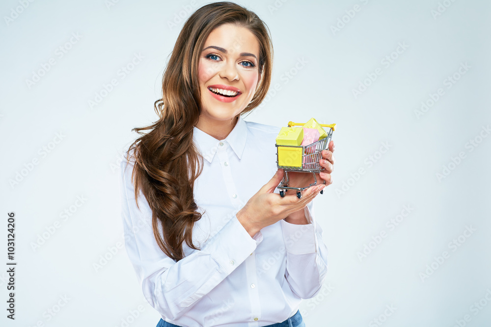 Smiling woman hold market card with gifts box. Smiling woman hold market card with gifts box.