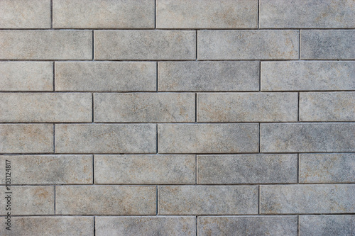 Grey brick tile wall background