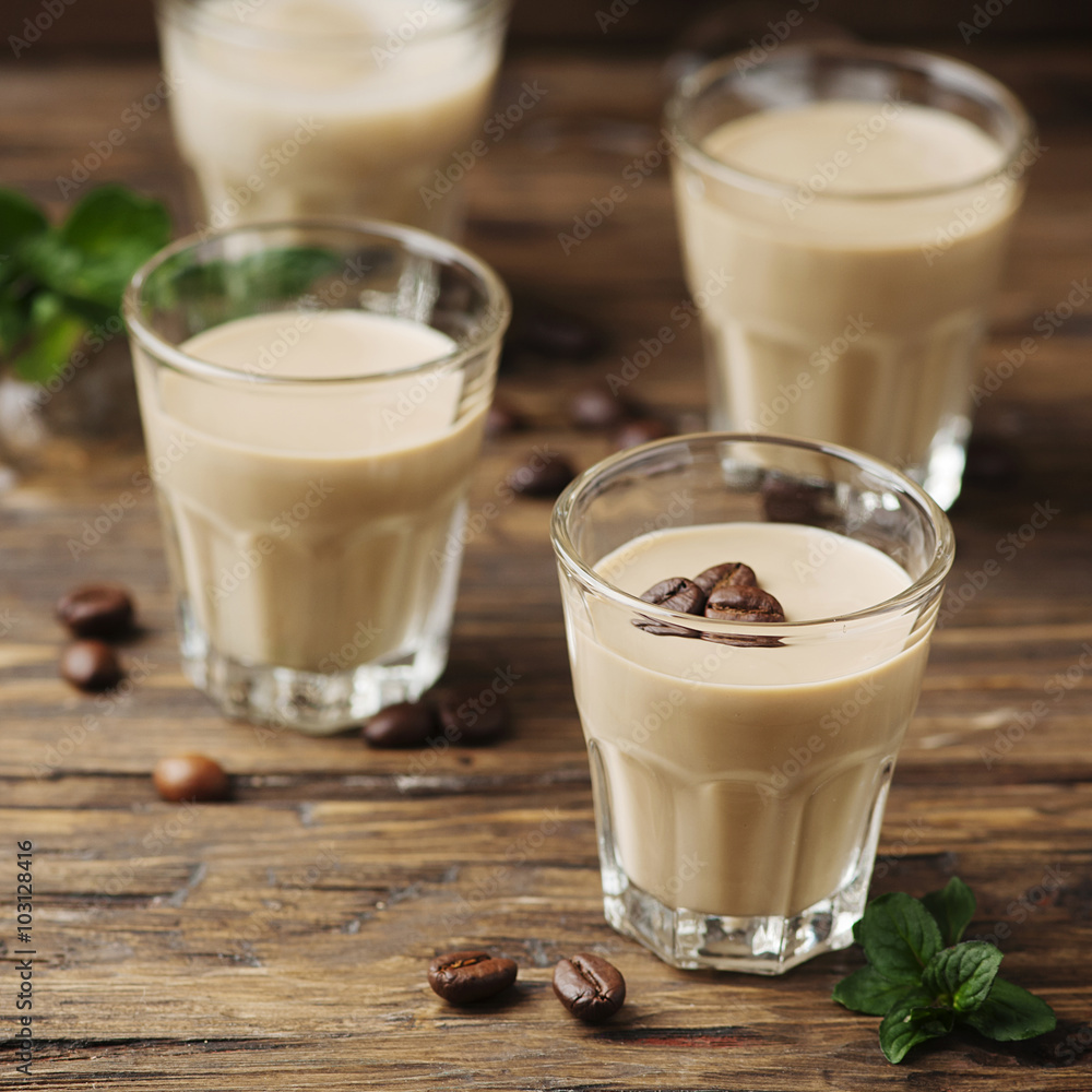 Cold cream with coffe and mint on the wooden table Cold cream with coffe and mint on the wooden table
