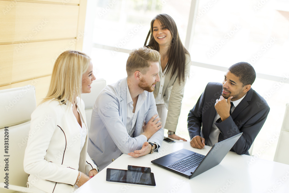 Young multiracial people in the office Young multiracial people in the office