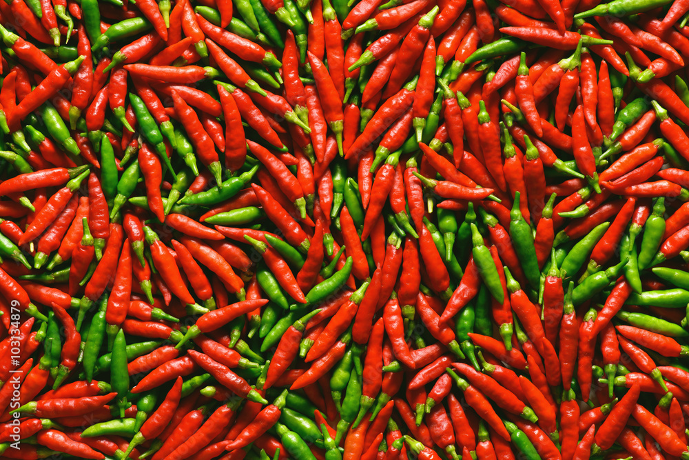 Background image of red and green peppers. Background image of red and green peppers.