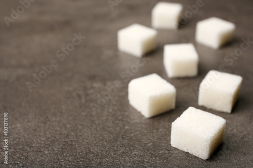 Pile of sugar cubes on the table