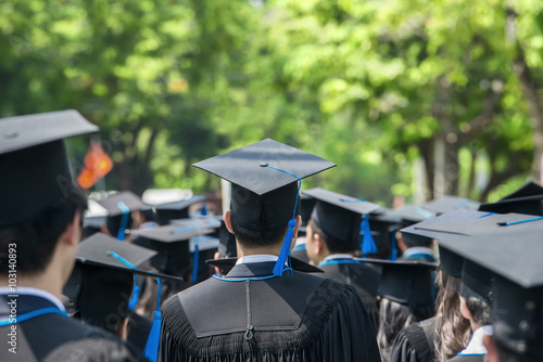 Принти на полотні back of graduates during commencement at university