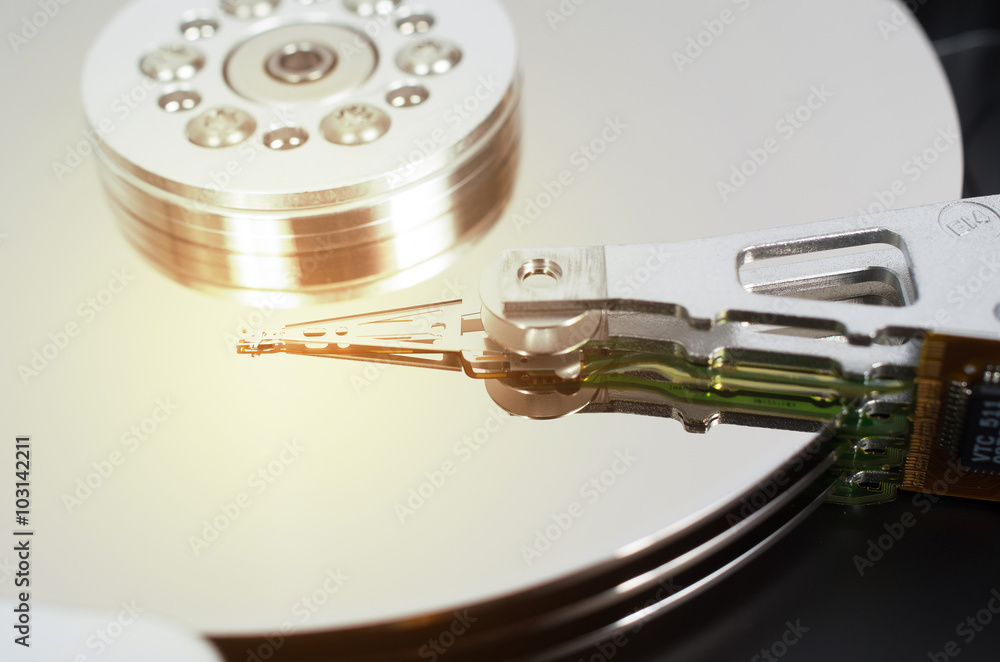 Close up view of modern hard drive platters with burning effect Close up view of modern hard drive platters with burning effect