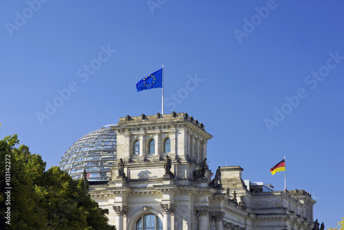 European Union (EU) and German flag on the national German parliament (Reichstag building)